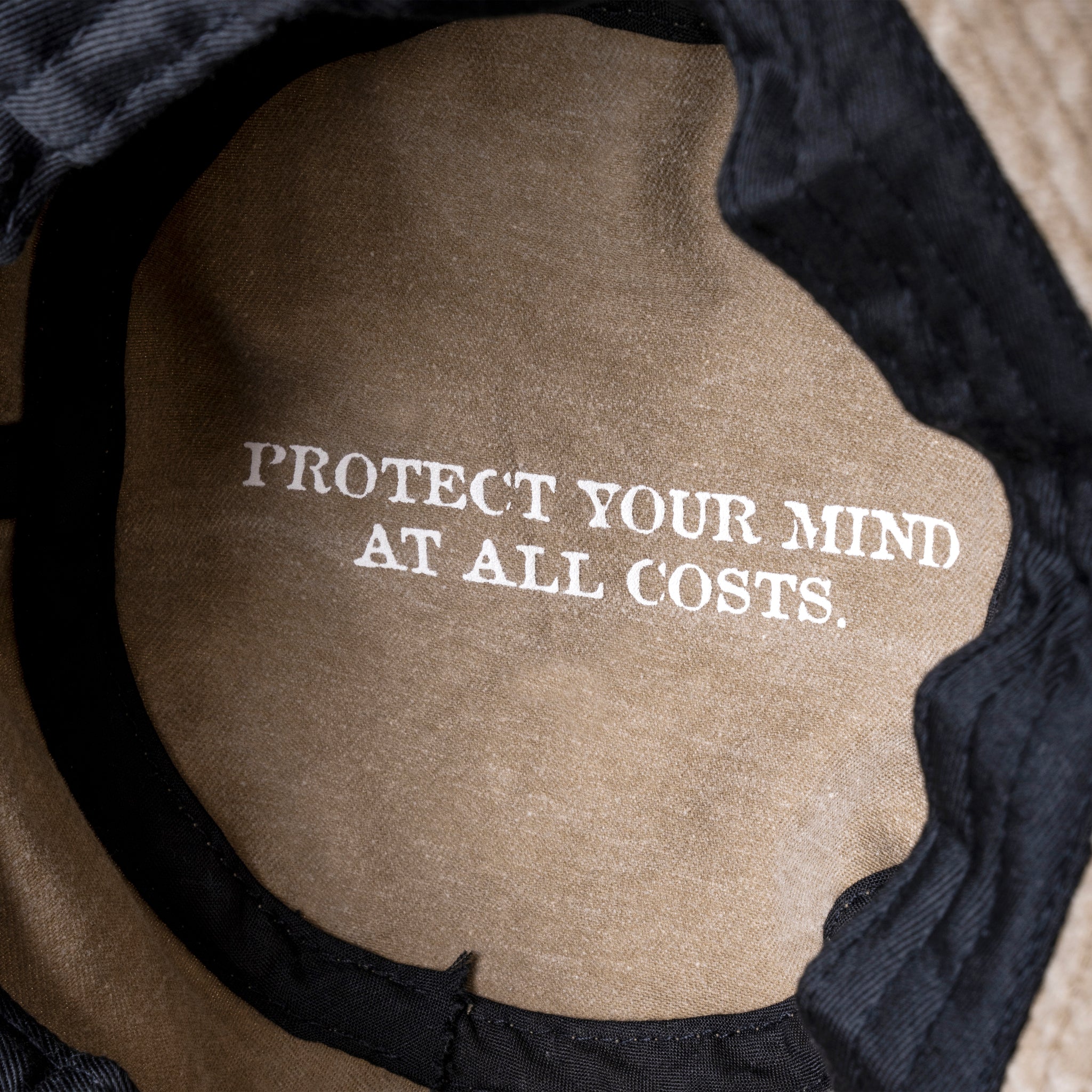 'PROTECT YOUR MIND' BUCKET HAT - KHAKI